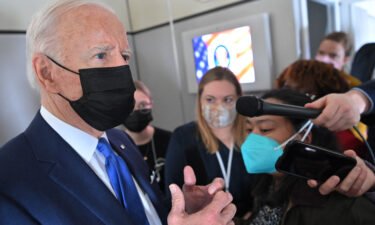 President Joe Biden will take extra precautions to avoid catching Covid-19 at this weekend's White House Correspondents Dinner. Biden is shown here speaking to reporters aboard Air Force One on Friday