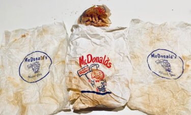 Rob and Gracie Jones found two hamburger wrappers and a half-eaten order of fries in a McDonald's bag behind their bathroom wall.