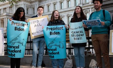 Activists attend a student loan debt forgiveness rally near the White House on Wednesday