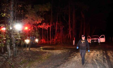 Investigators at the scene of Friday night's shooting. Five people were injured in an April 1 shooting along a rural road in South Carolina.