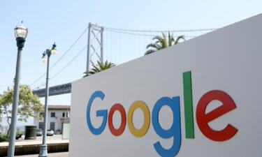 A sign is posted in front of a Google office on April 26