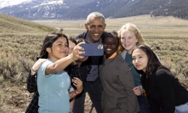 Students taking selfie with former President Obama