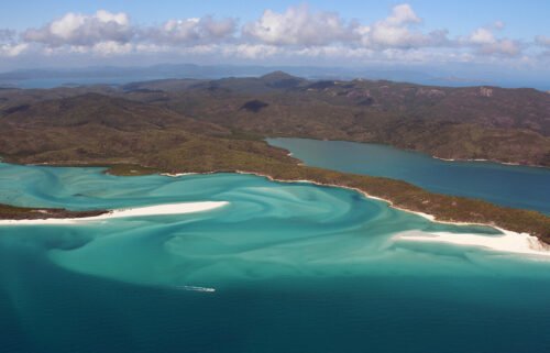 Indulgence in Fried foods and 'revenge travel' is back. Pictured are Australia's Whitsunday Islands