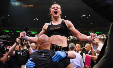 Katie Taylor celebrates victory after her undisputed world lightweight championship fight with Amanda Serrano at Madison Square Garden in New York.