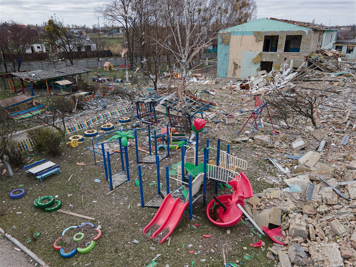 <i>Alexey Furman/Getty Images</i><br/>A damaged playground is seen next to the Barvinok kindergarten building in Makariv
