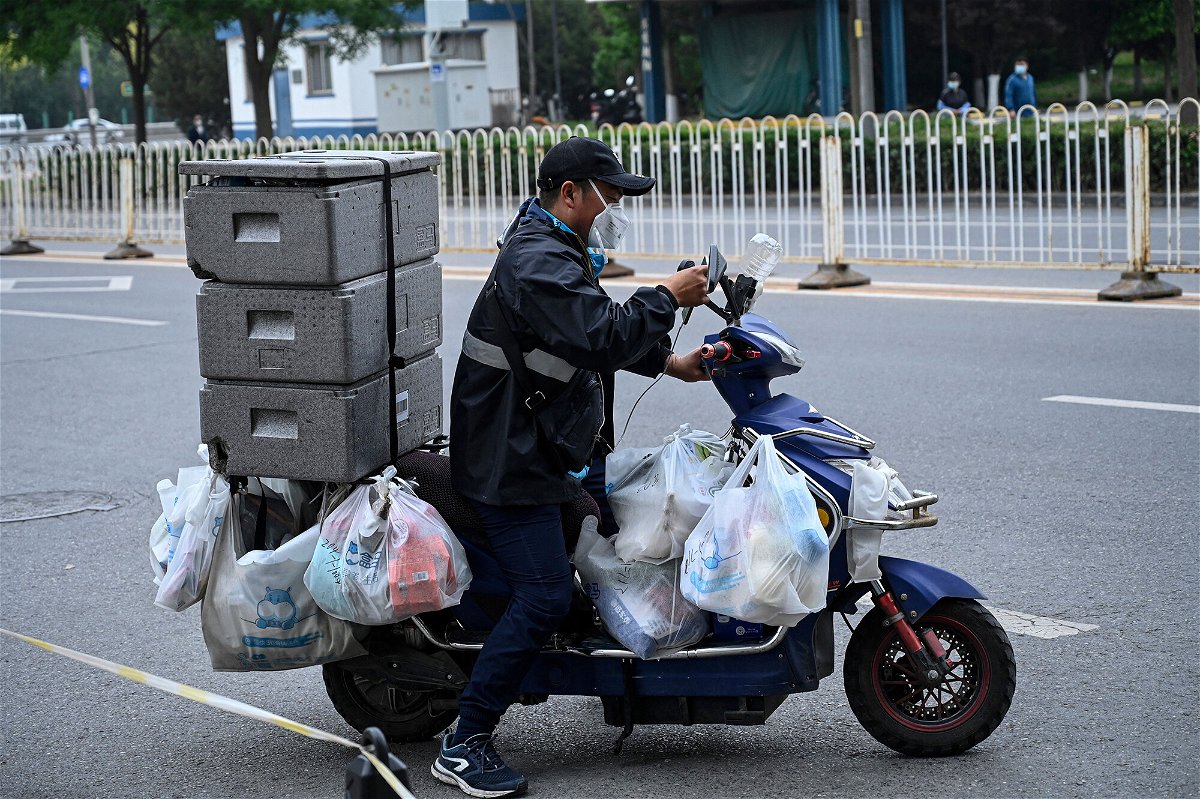 <i>Jade Gao/AFP/Getty Images</i><br/>China's economy has slumped as Covid-19 cases surged in the world's most populous country. But Chinese consumers stuck at home are still spending.