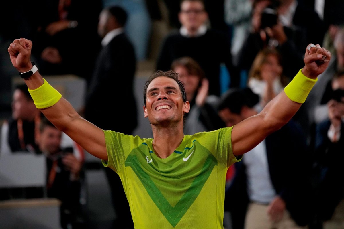 <i>Christophe Ena/AP</i><br/>Spain's Rafael Nadal celebrates winning his quarterfinal match against Serbia's Novak Djokovic in four sets at the French Open tennis tournament in the Roland Garros stadium in Paris on June 1.