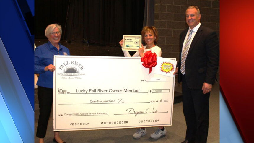 Dorthea Glander22_Pictured with Glander is Dede Draper, Fall River Electric board president & Bryan Case, Fall River CEO:General Manager