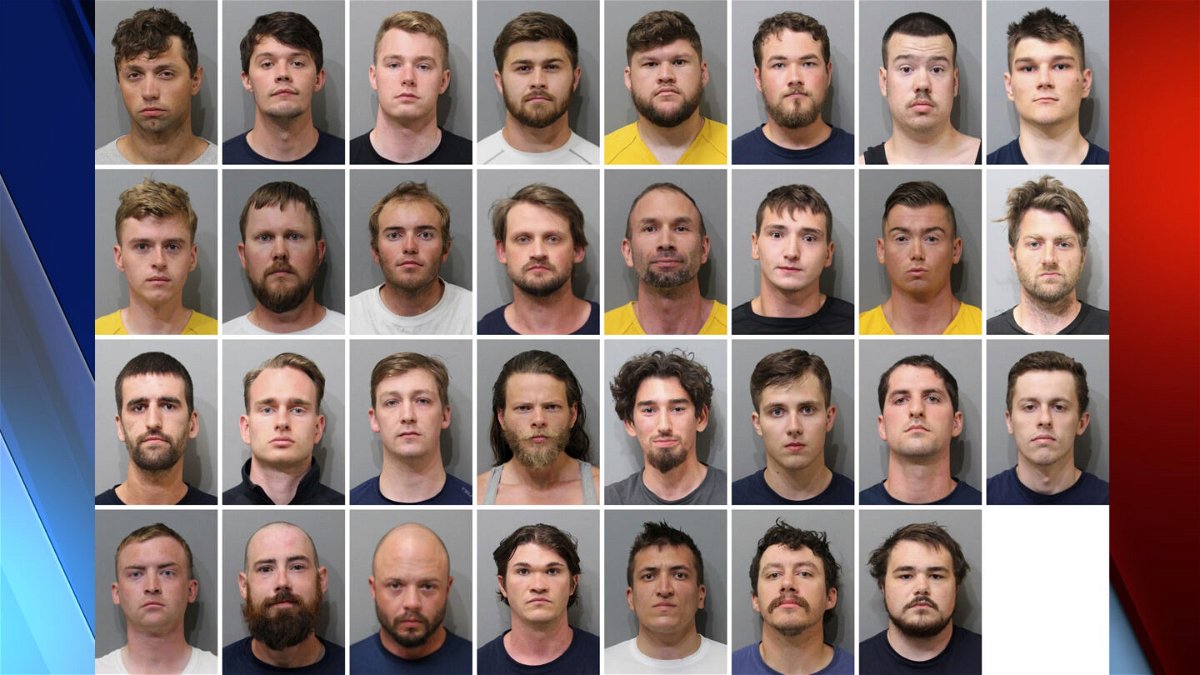 These booking images provided by the Kootenai County Sheriff’s Office show the 31 members of the white supremacist group Patriot Front who were arrested after they were found packed into the back of a U-Haul truck with riot gear near an LGBTQ pride event in Coeur d’Alene, Idaho, on Saturday, June 11, 2022. Top row, from left, are Jared Boyce, Nathan Brenner, Colton Brown, Josiah Buster, Mishael Buster, Devin Center, Dylan Corio, and Winston Durham. Second row, from left, are Garret Garland, Branden Haney, Richard Jessop, James Julius Johnson, James Michael Johnson, Connor Moran, Kieran Morris and Lawrence Norman. Third row, from left, are Justin O'leary, Cameron Pruitt, Forrest Rankin, Thomas Rousseau, Conor Ryan, Spencer Simpson, Alexander Sisenstein and Derek Smith. Bottom row, from left, are Dakota Tabler, Steven Tucker, Wesley Van Horn, Mitchell Wagner, Nathaniel Whitfield, Graham Whitsom and Robert Whitted. 