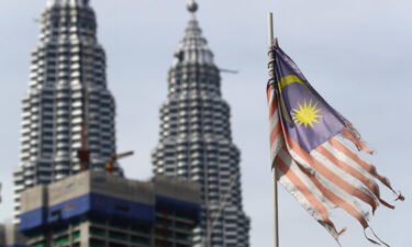 Malaysia's government says it will abolish the death penalty and halt all executions