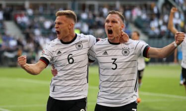 Joshua Kimmich (left) scored Germany's first goal against Italy.