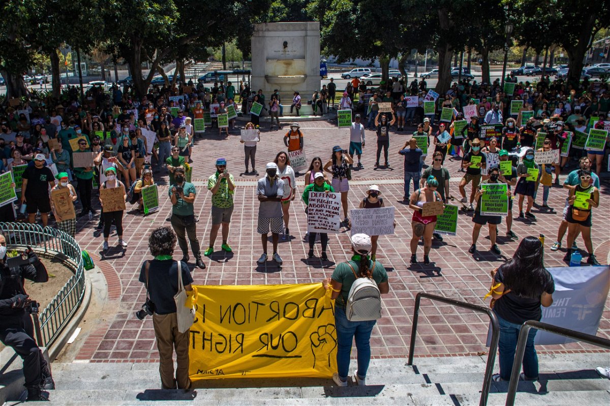<i>Apu Gomes/AFP/Getty Images</i><br/>Protesters gather in front of the Los Angeles City Hall in downtown Los Angeles on June 26