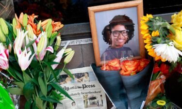 A memorial honors Sierra Jenkins and others shot outside a pizza restaurant in Norfolk