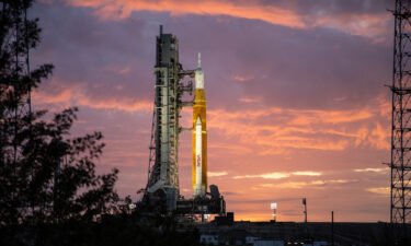 The sunrise casts a golden glow on the Artemis I Space Launch System (SLS) and Orion spacecraft at Launch Pad 39B at NASA's Kennedy Space Center in Florida on March 23.