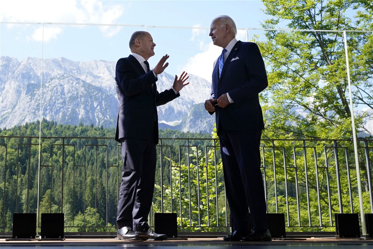 <i>Susan Walsh/AP</i><br/>President Joe Biden and German Chancellor Olaf Scholz stand together and speak during a bilateral meeting at the G7 Summit in Elmau