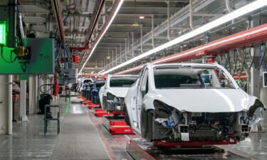 Cars are seen on the assembly line during a tour of the Tesla Giga Texas manufacturing facility ahead of the "Cyber Rodeo" grand opening party on April 7 in Austin