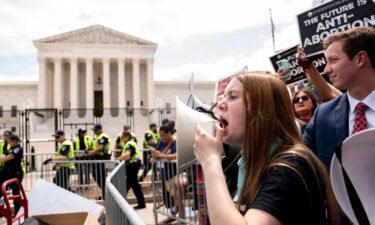 Anti-abortion activists gather outside the US Supreme Court in Washington