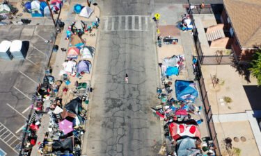 An aerial view of people gathered near a homeless encampment on July 21 in Phoenix