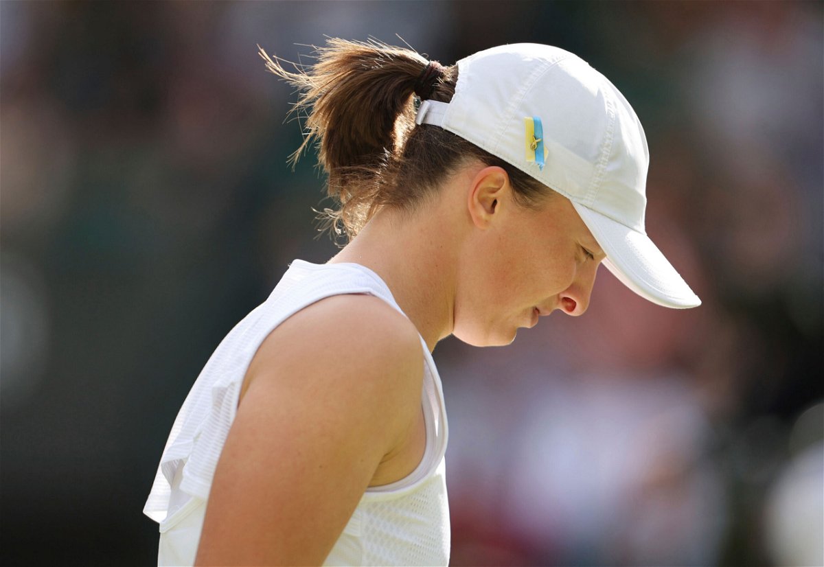 <i>Takuya Matsumoto/The Yomiuri Shimbun/AP</i><br/>Iga Swiatek of Poland looks disappointed at losing the game against Alizé Cornet of France in the ladies' singles third-round match at Wimbledon.