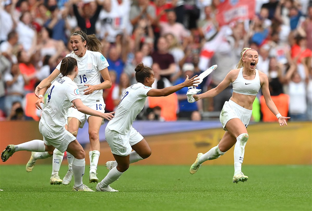 <i>Shaun Botterill/Getty Images</i><br/>Chloe Kelly celebrates after scoring the match-winning goal during the UEFA Women's Euro 2022 Final.