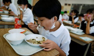 A student eats lunch at Senju Aoba Junior High School in Tokyo