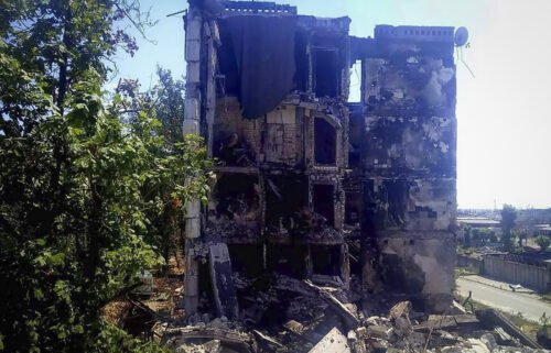 Damaged residential buildings are seen in Lysychansk