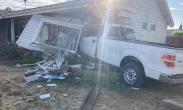 A man was seriously hurt Thursday evening after a suspect fleeing police crashed a pickup truck into his home.