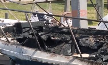 A Martin County man who was unresponsive and trapped inside a burning boat was rescued by two Martin County Sheriff's Office deputies.