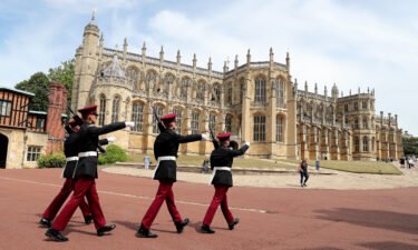 Soldiers in the grounds of Windsor Castle during its reopening on July 23