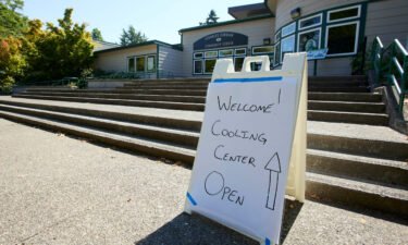 A sign welcomes visitors seeking relief from the heat Tuesday at Charles Jordan Community Center in Portland