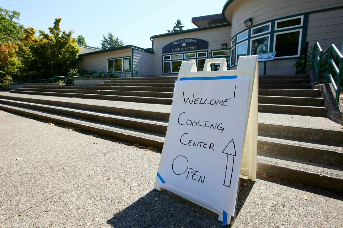 <i>Craig Mitchelldyer/AP</i><br/>A sign welcomes visitors seeking relief from the heat Tuesday at Charles Jordan Community Center in Portland