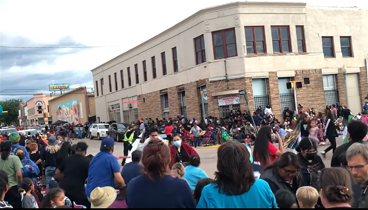 <i>From Sean Justice</i><br/>A screengrab from a witness video shows the moment crowd members realized a car was driving through a parade in the city of Gallup