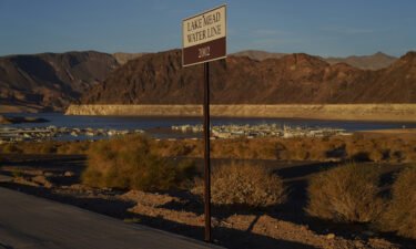 A sign marks the water line from 2002 near Lake Mead at the Lake Mead National Recreation Area on July 9