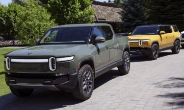 A Rivian R1T Truck and R1S SUV is parked outside the Allen & Company Sun Valley Conference on July 8 in Sun Valley