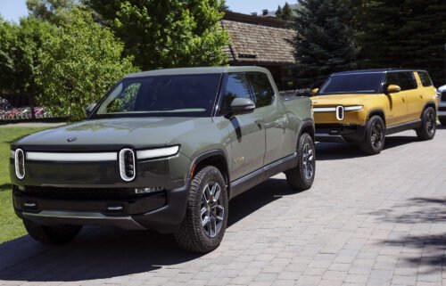 A Rivian R1T Truck and R1S SUV is parked outside the Allen & Company Sun Valley Conference on July 8 in Sun Valley