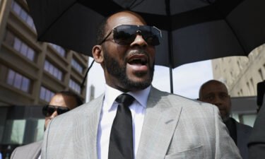Musician R. Kelly leaves the Leighton Criminal Court building in Chicago on June 6