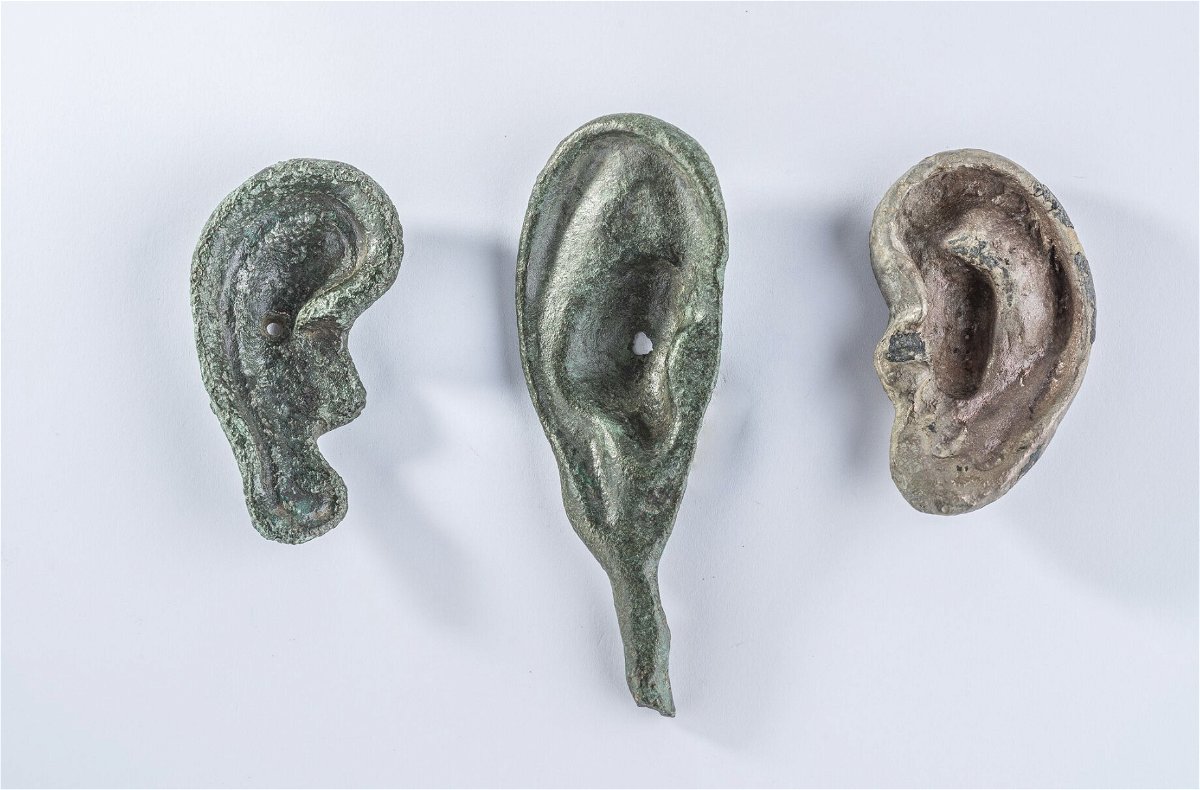 <i>Emanuele Mariotti/SABAP-SI</i><br/>A collection of three ear-shaped votive offerings unearthed at San Casciano dei Bagni.