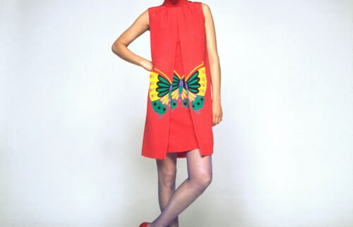 Model Benedetta Barzini wearing a Hanae Mori sleeveless dress printed with a yellow-and-green butterfly