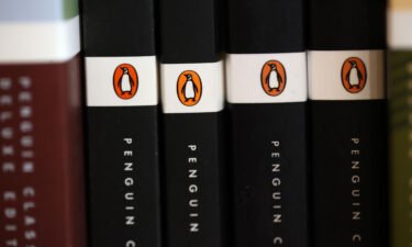 The U.S. Department of Justice is suing Penguin Random House and Simon & Schuster to block the companies from completing a merger.