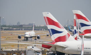 British Airways planes taxi at Heathrow Airport