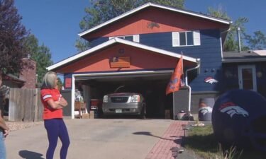 Danielle Pursley has been a Broncos fan since birth and makes sure everyone in her neighborhood knows.