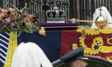 The Queen’s coffin makes its way to Westminster Abbey for her funeral service.