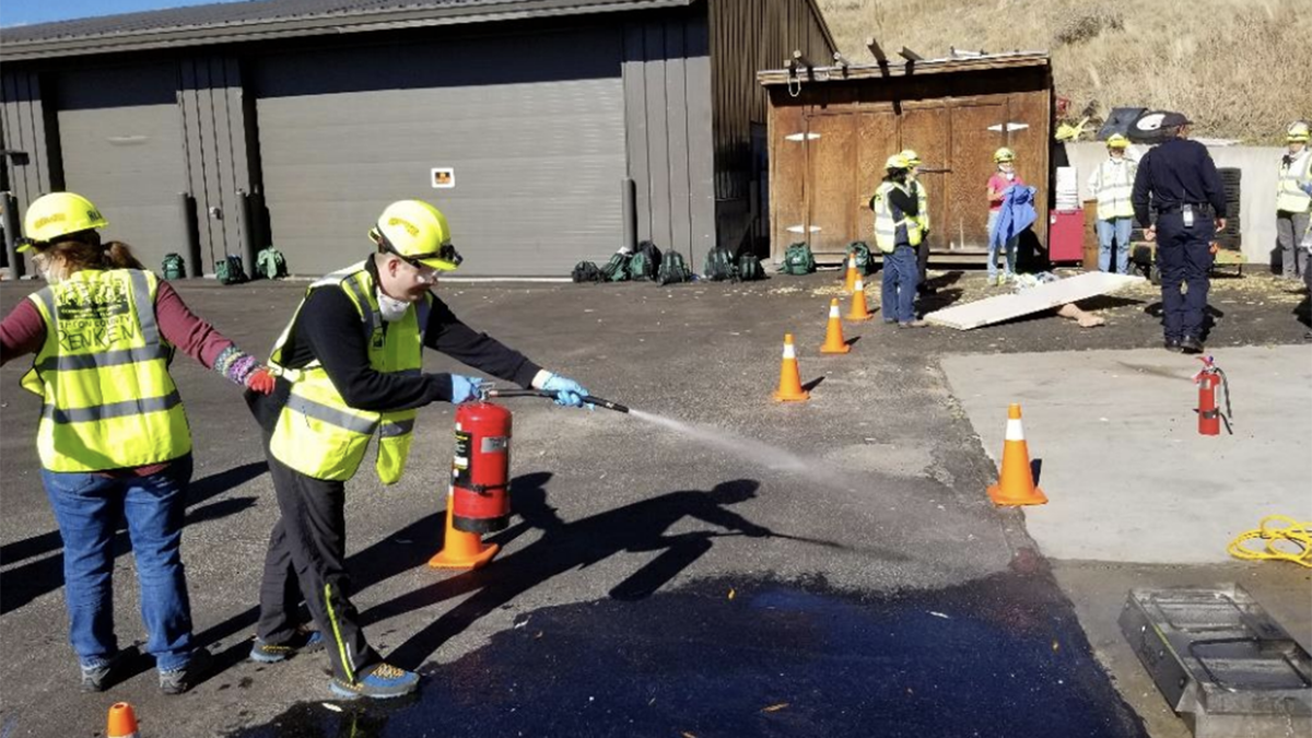 The Teton County Community Emergency Response Team gets practice using fire extinguishers.