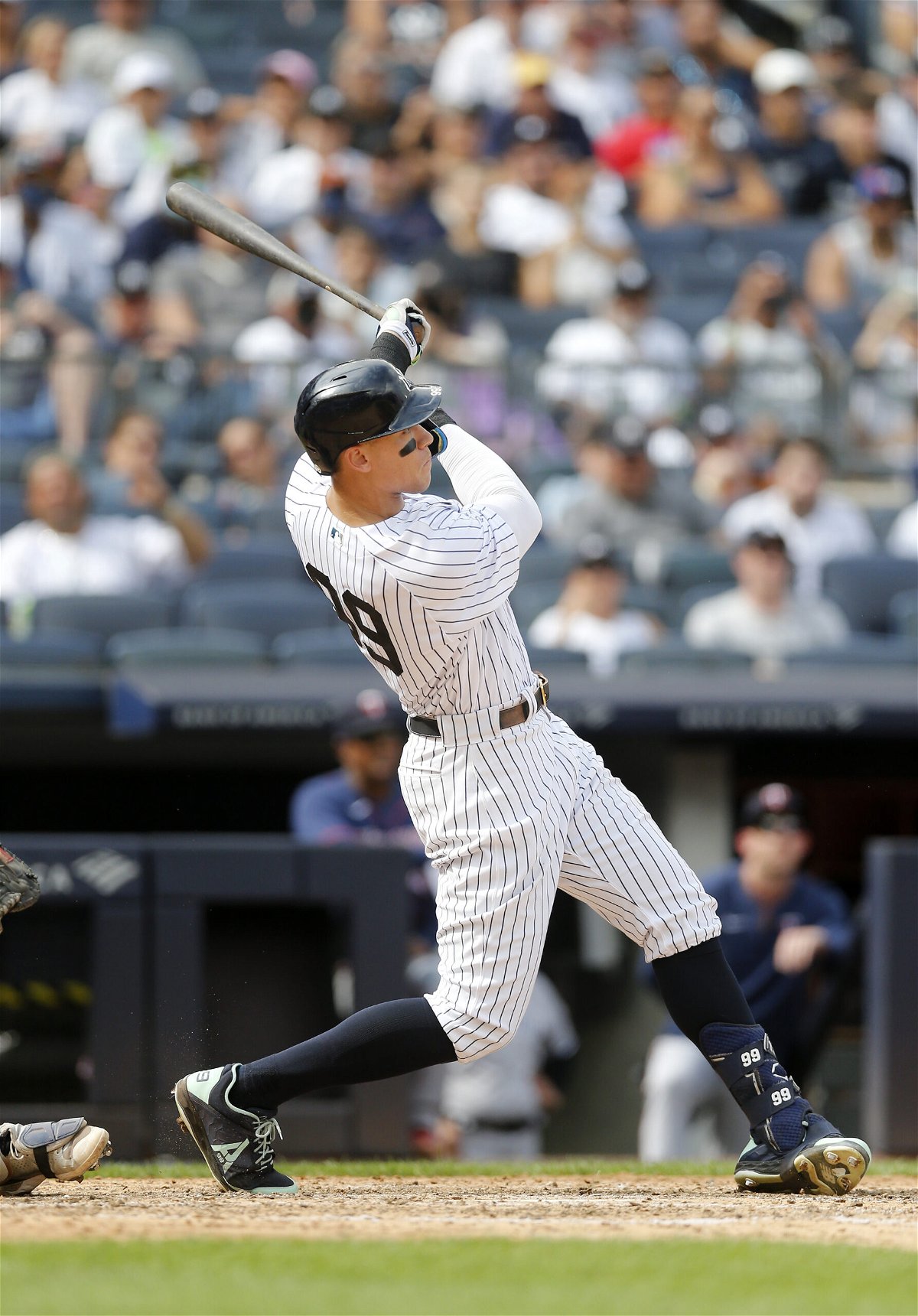 <i>Jim McIsaac/Getty Images</i><br/>Judge hits a two-run home run against the Twins.