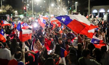 Some waved flags as they celebrated the rejection of the proposed constitution in Santiago
