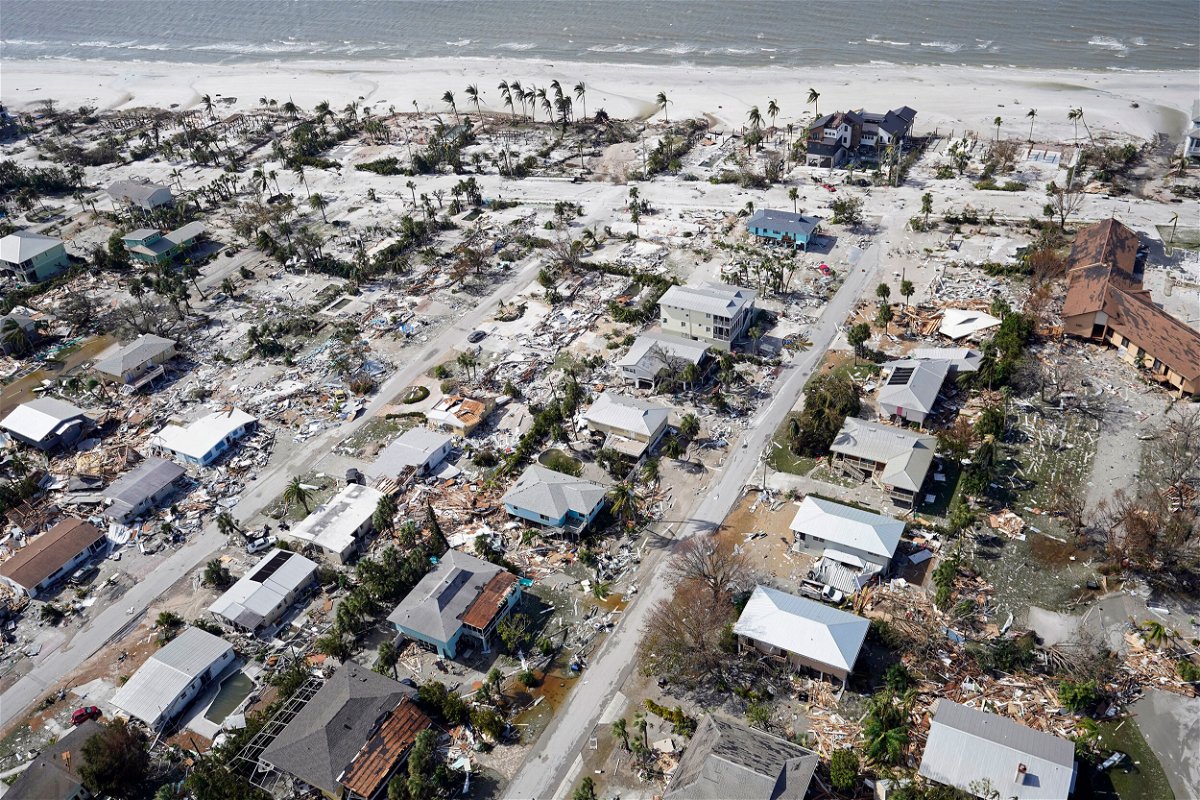<i>Wilfredo Lee/AP</i><br/>This aerial photo shows damaged homes and debris in the aftermath of Hurricane Ian on September 29 in Fort Myers