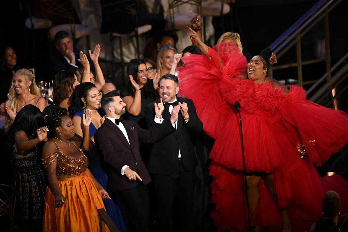 <i>Patrick T. Fallon/AFP/Getty Images</i><br/>Lizzo celebrates her Emmy Award for 