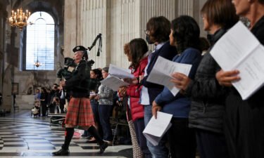 A piper attends a service for Queen Elizabeth II at St. Paul's Cathedral in London on September 9 a day after her death.