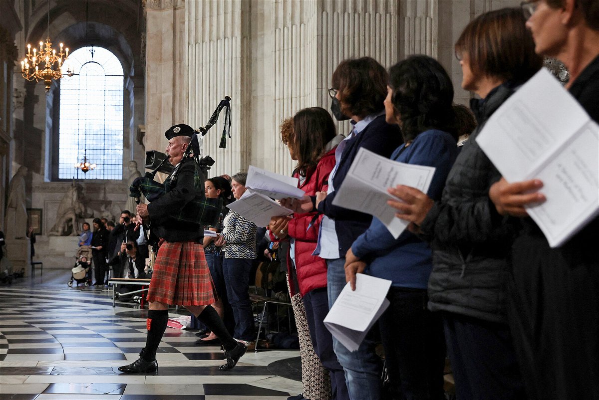 <i>PAUL CHILDS/AFP/Getty Images/File</i><br/>A piper attends a service for Queen Elizabeth II at St. Paul's Cathedral in London on September 9 a day after her death.