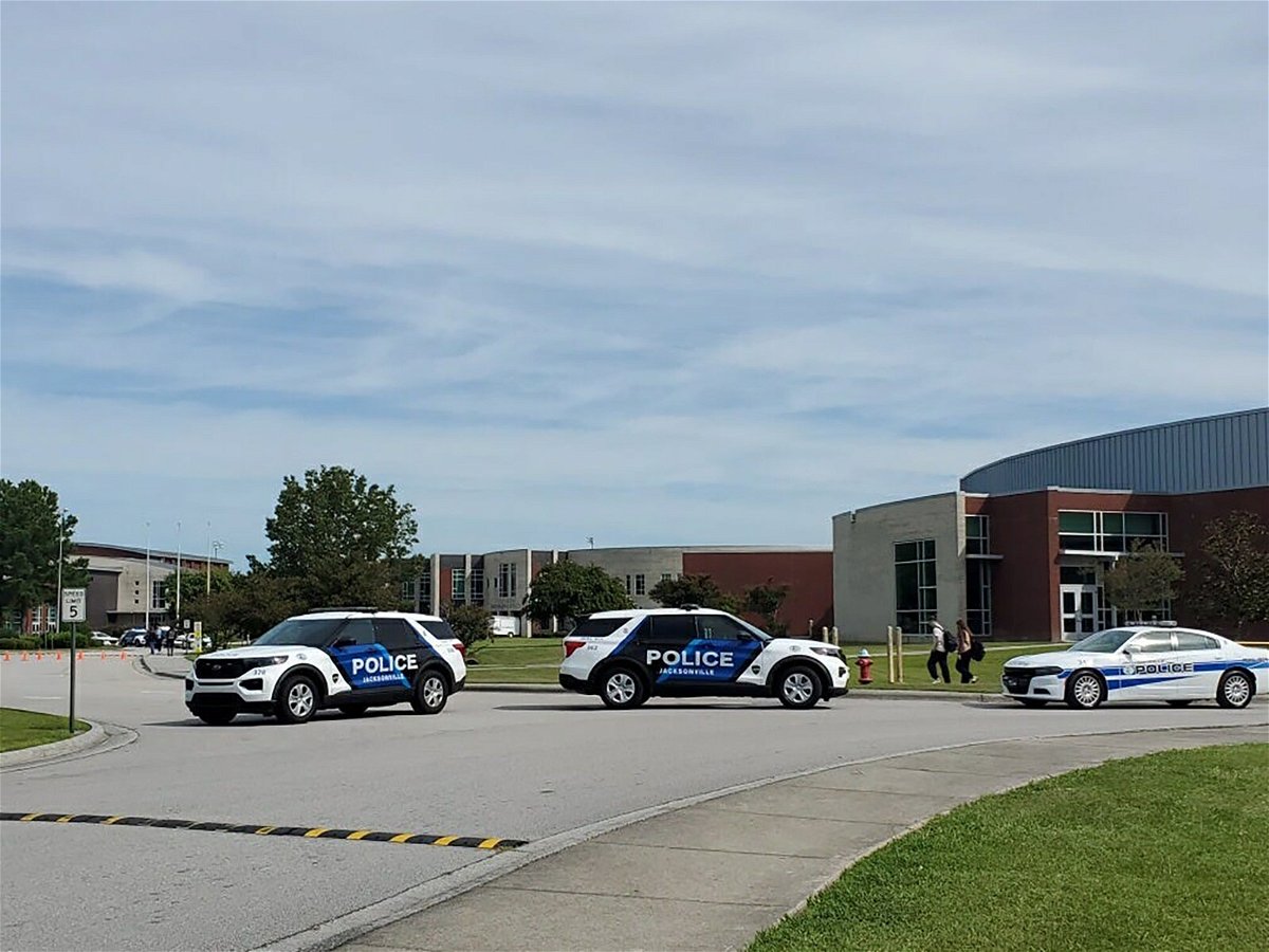 <i>Trevor Dunnell/daily News/USA Today Network</i><br/>Jacksonville police on the scene at Northside High School where one student was killed in a fatal stabbing.